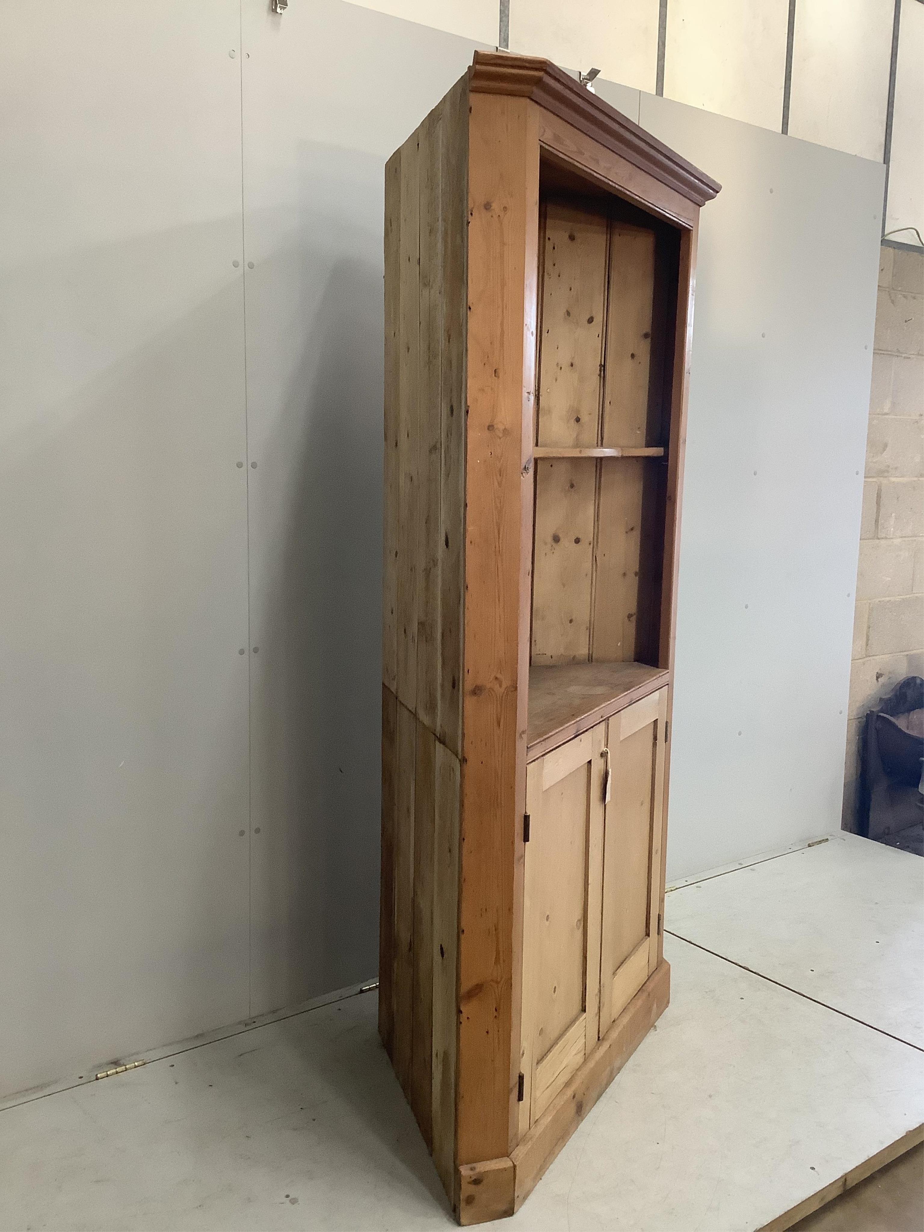 A 19th century pine standing corner cupboard, width 106cm, depth 52cm, height 199cm. Condition - fair